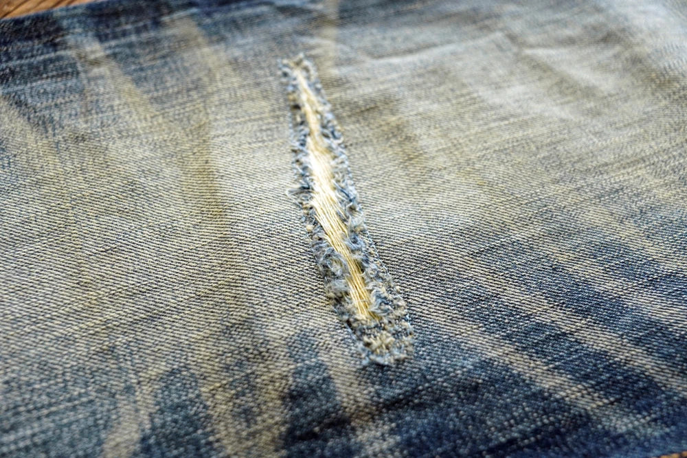 Herren Jeans im Vintage-Stil aus Denim mit Distressed Kanten