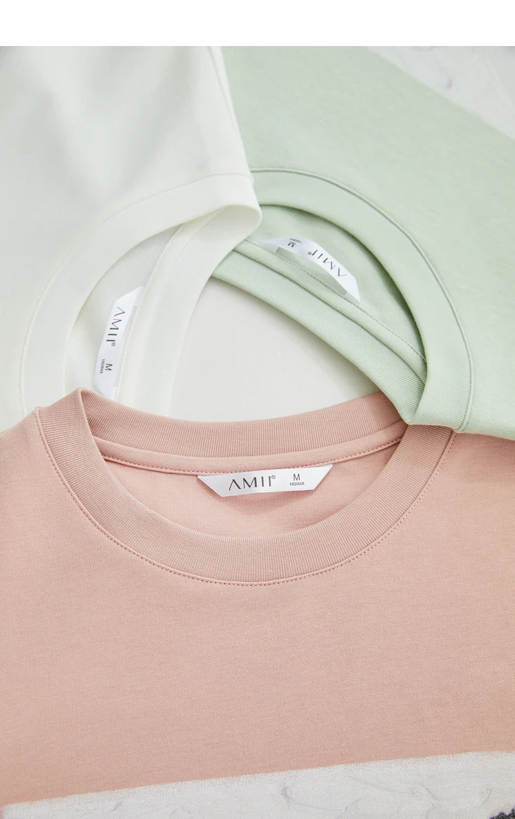 Damen T-Shirt im Minimalismus-Stil mit Kunstdruck und Stickerei für den Herbst