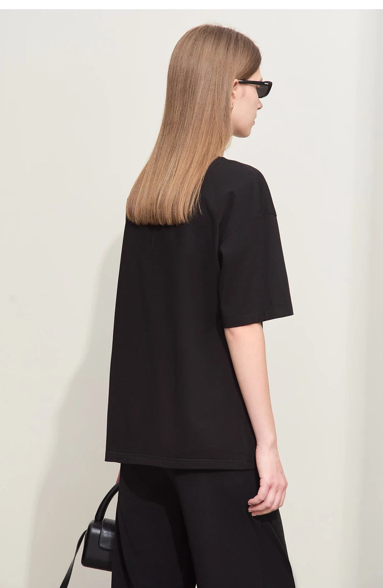 Damen T-Shirts im Minimalismus-Stil mit Stickerei und lässigen Ärmeln