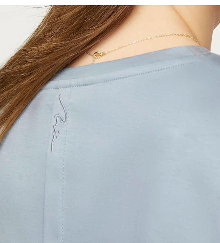 Damen Tops im Minimalismus-Stil mit V-Ausschnitt und kurzen Ärmeln