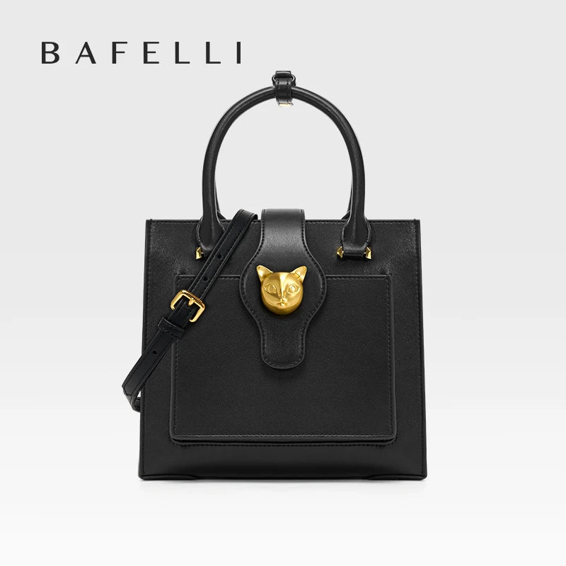 Damen-Ledertasche schwarz mit Henkel, Schulterriemen, Katzenkopf-Front und Goldbeschlägen
