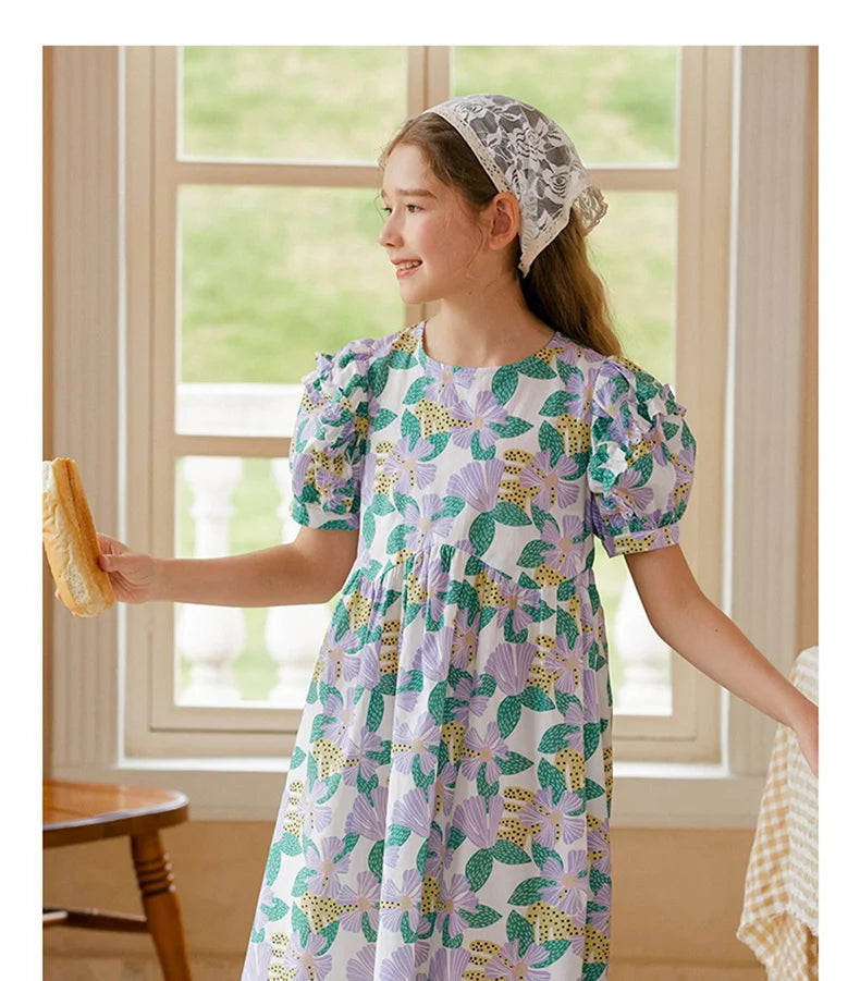 Kurzes Mädchen-Kleid mit Puffärmeln und Cheongsam-Design, Patchwork aus Gaze in Lila-Blau, mit Perlenknöpfen – für Kinder von 3 bis 12 Jahren.