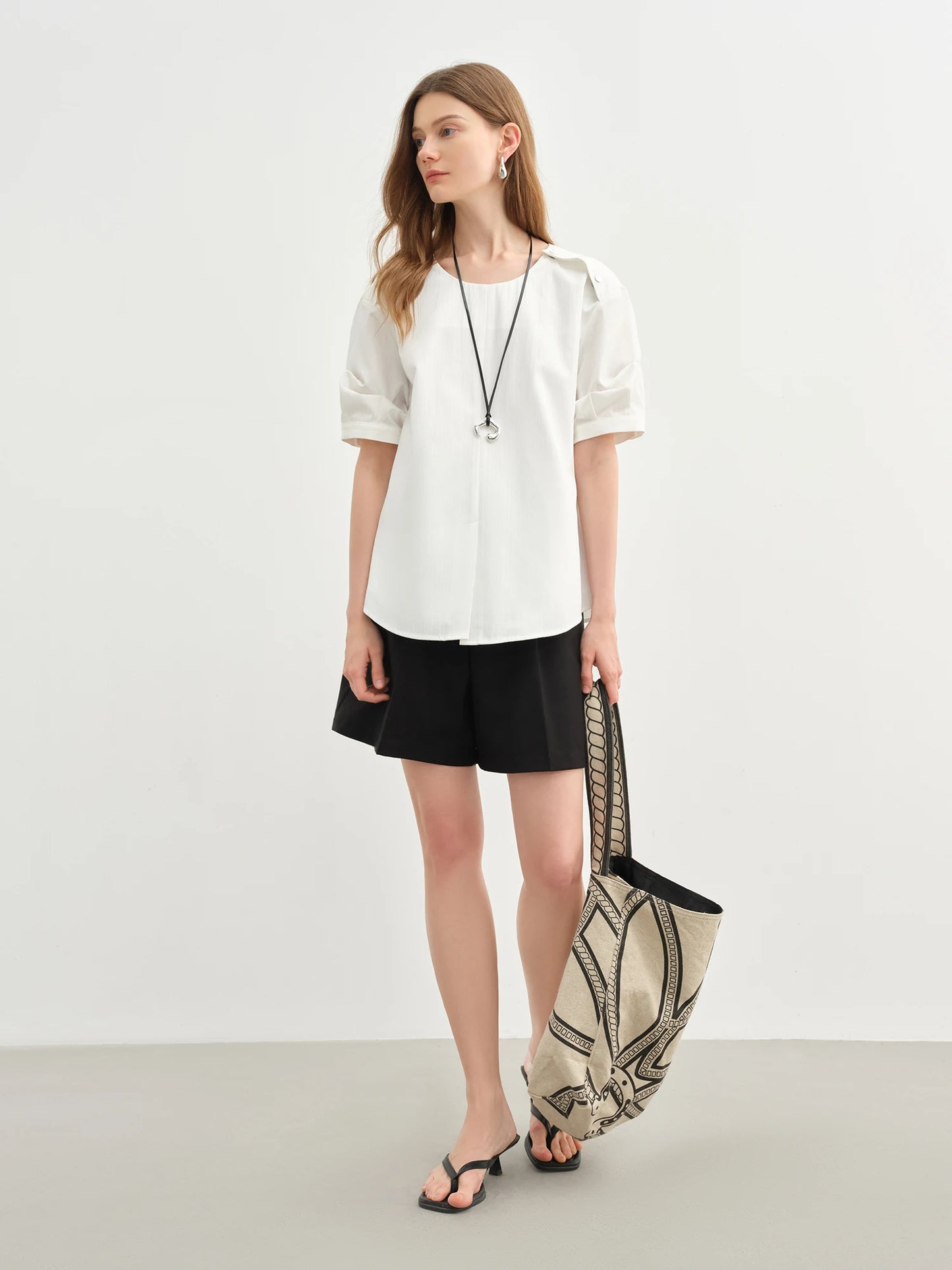 Damen-Polo-Shirt aus Baumwolle mit Polokragen, tailliertem Schnitt und abgerundetem Saum – ideal für den Sommer und den Alltag