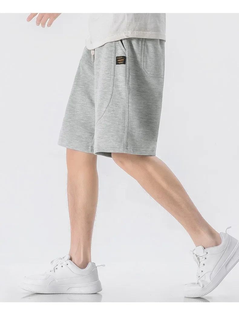 Leichte Herren-Strickjacke mit Waffelstruktur, Taschen und Reverskragen – ideal für Frühling und Herbst.