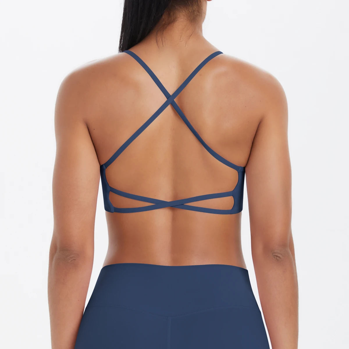 Damen-Yoga-BH Rückansicht mit gekreuztem Trägerkreuz und breitem Unterband, blau