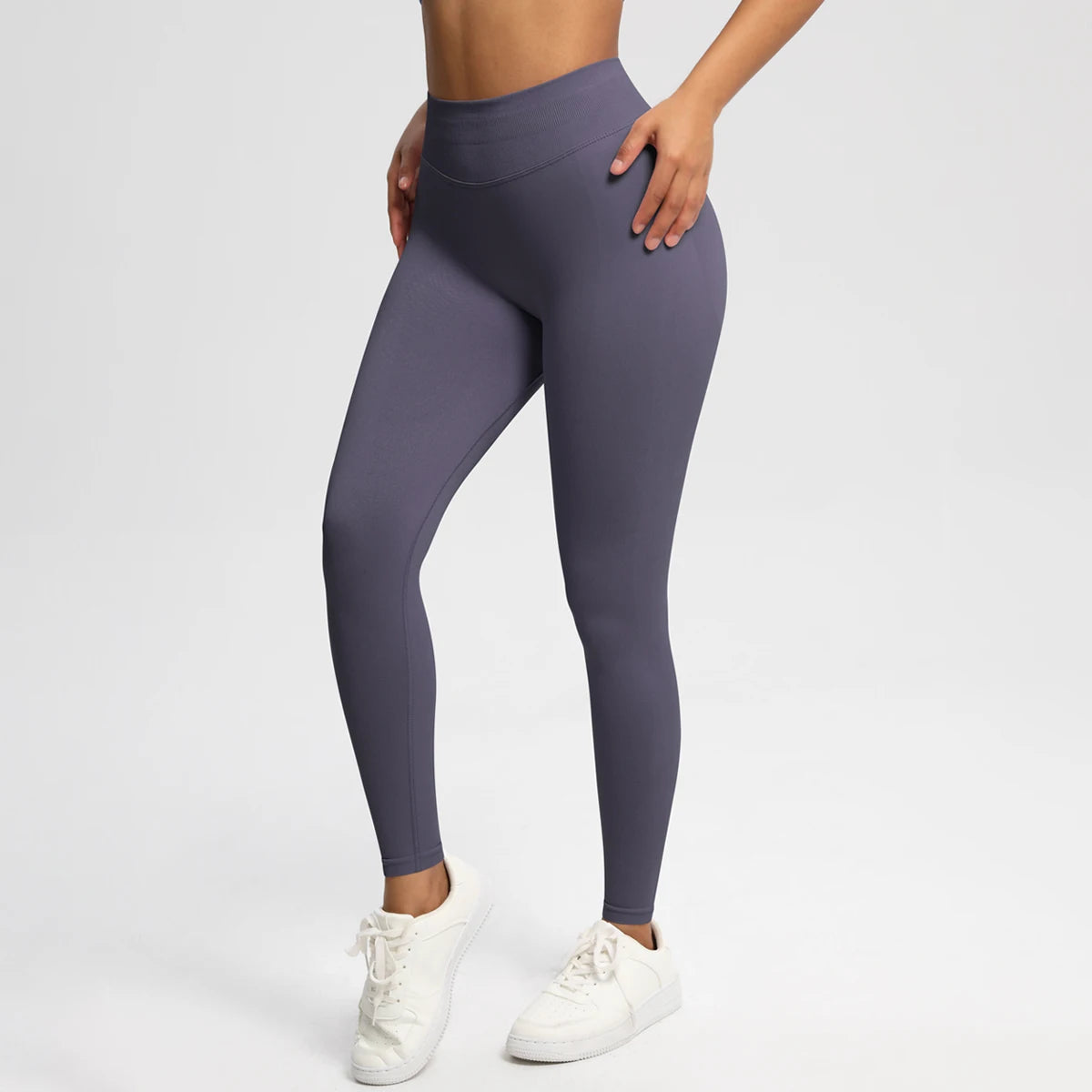 Nahtlose High-Stretch-Leggings dunkellila, Vorderansicht mit hohem Bund