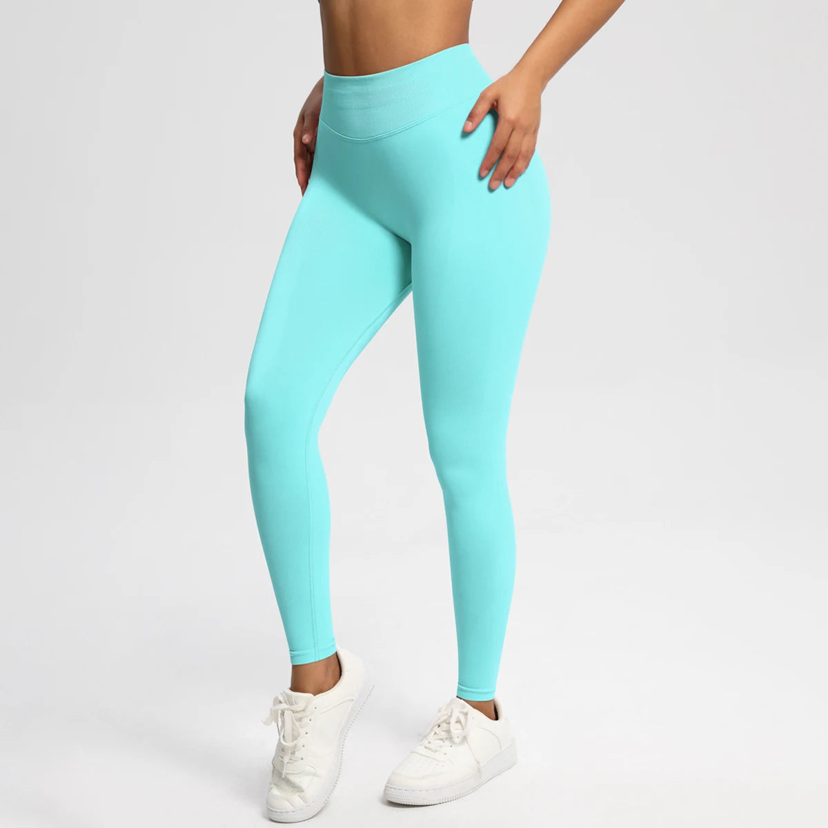 Nahtlose High-Stretch-Leggings in Türkis-Mint, körperbetont mit langem Bein