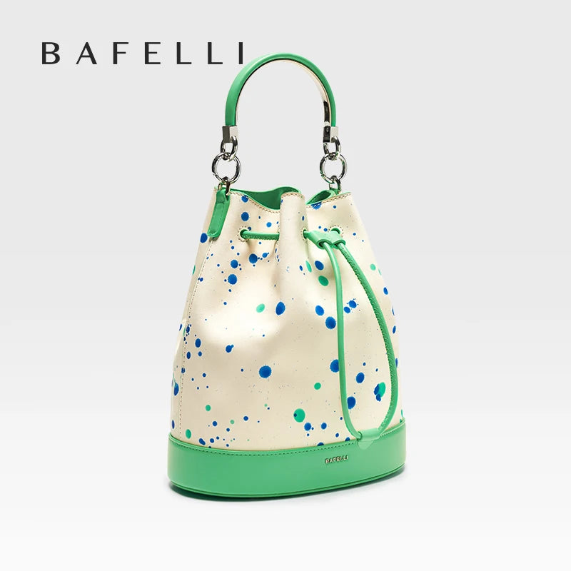 Damen-Handtasche aus Leder mit kurzem Griff, cremefarben, grüne Kanten, Punktmuster