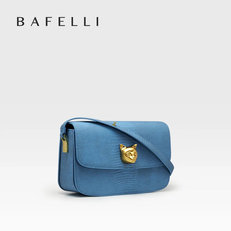 Kastenförmige Ledertasche in Retro-Blue, Umhängetasche mit goldfarbener Katzenkopf-Schließe
