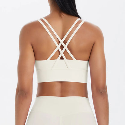 Sporttop mit Kreuzträgern in Creme, Rückansicht mit breitem Bund