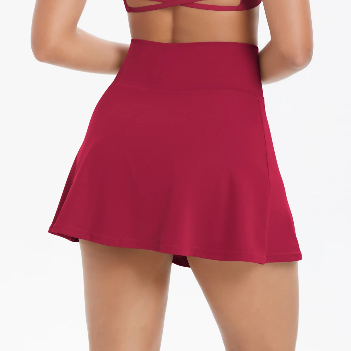 Tennisrock mit Sicherheits-Short, dunkelrot, weit schwingender Saum mit Innenhose