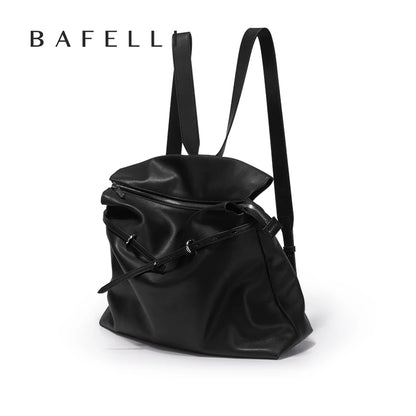BAFELLI Rucksack aus schwarzem Echtleder, Seitenansicht mit Fronttasche und Kordelzug
