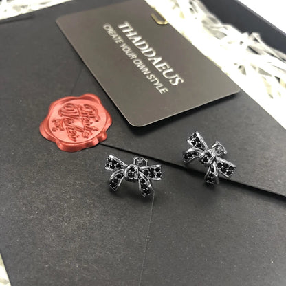 Damen-Ohrstecker Bogen Knoten glamourös aus Sterlingsilber