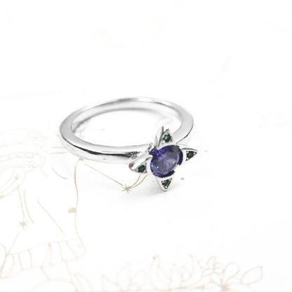 Vorderansicht: 925-Silberring mit violettem Stein und grünen Verzierungen