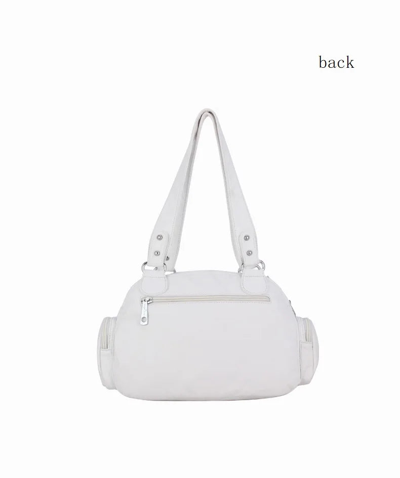 Damen-Schultertasche aus PU-Leder in kompakter Bauweise mit Angenehmer Haptik und Mehrfachfächern