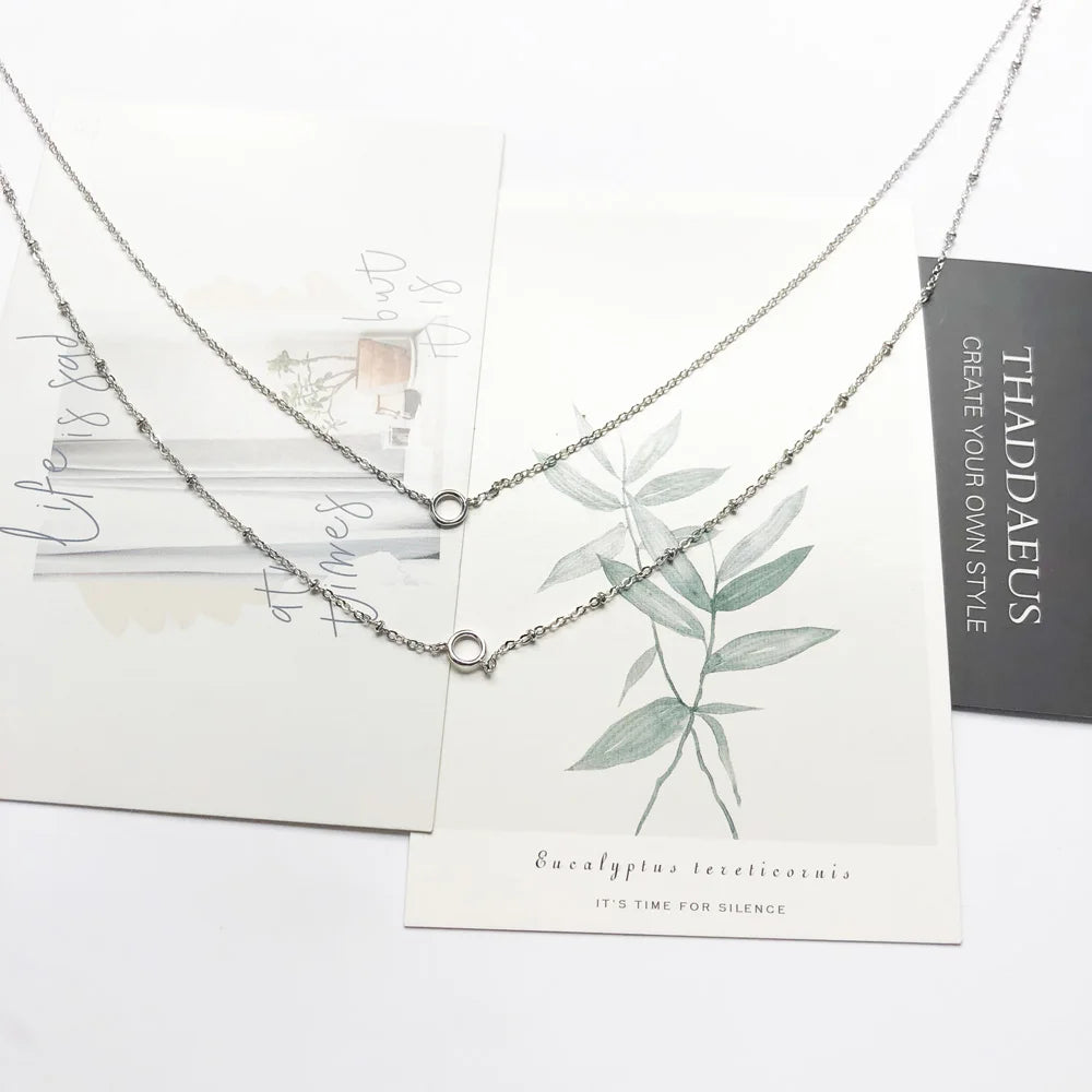 Doppelte Silber-Halskette mit zwei Reihen und Kreis-Charms am Anhänger