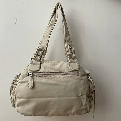 Damen-Schultertasche aus PU-Leder in kompakter Bauweise mit Angenehmer Haptik und Mehrfachfächern