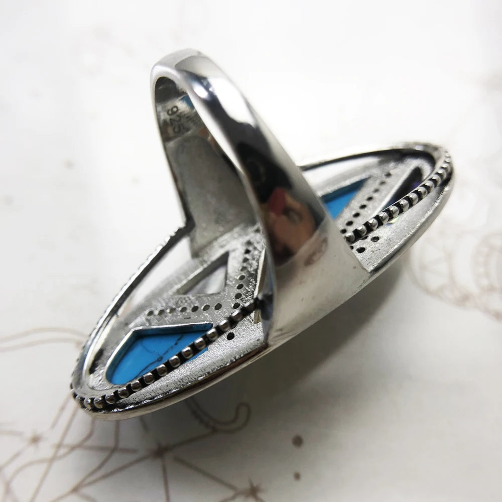 Rückansicht eines 925 Sterling-Silberrings mit Türkis-Einsatz und filigranen Zierungen