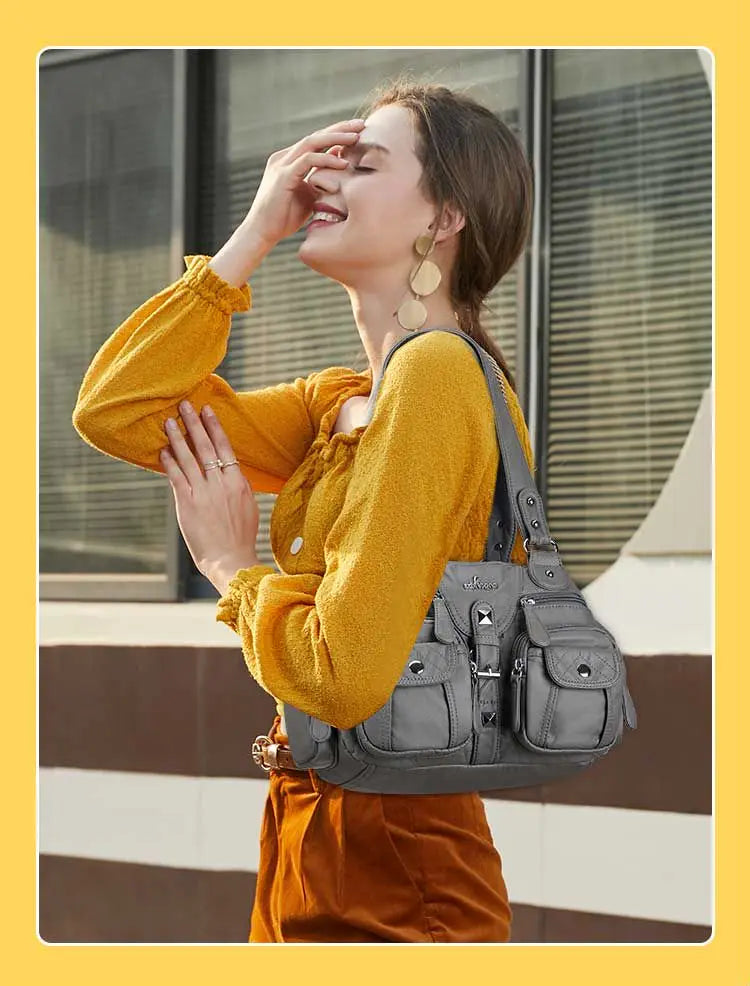 Damen-Schultertasche aus PU-Leder in kompakter Bauweise mit Angenehmer Haptik und Mehrfachfächern
