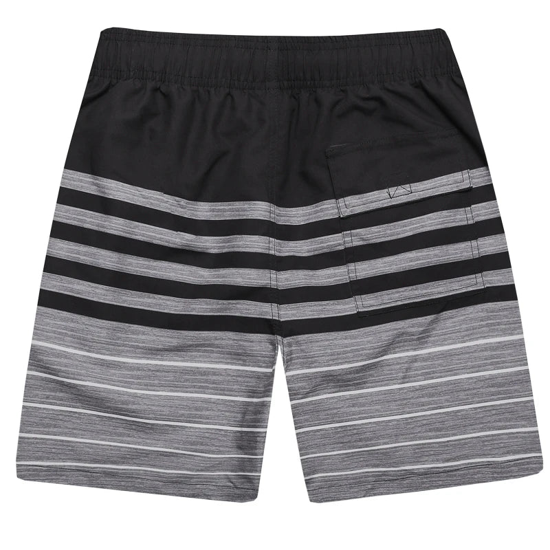 Herren-Badeshorts aus Polyester mit abnehmbarem Polster und niedrigem Bund – ideal für den Sommer.