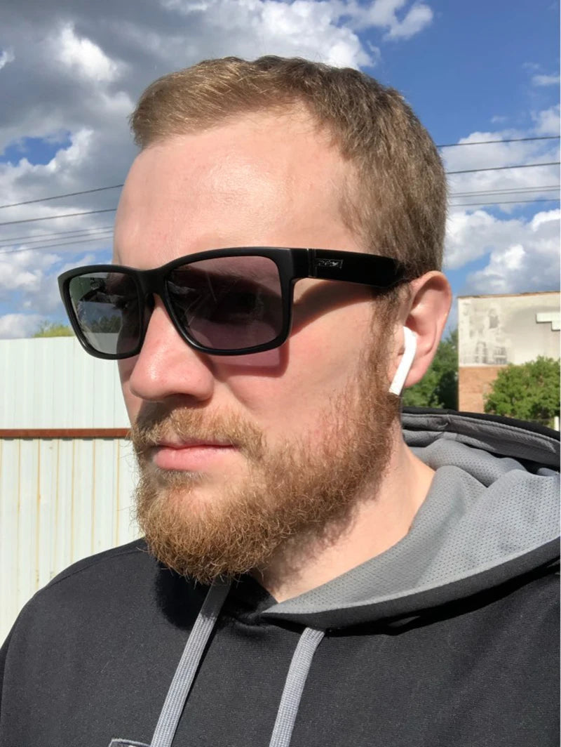 Sonnenbrille Sport polarisiert photochrom Fahren auffällige Farben Hartbox