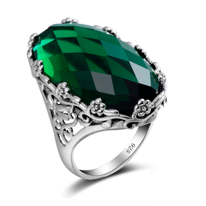Damen-Ring aus 925er Sterlingsilber mit smaragdgrünem Stein und aufwändigem Blütenmuster