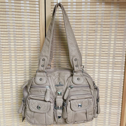 Damen-Schultertasche aus PU-Leder in kompakter Bauweise mit Angenehmer Haptik und Mehrfachfächern