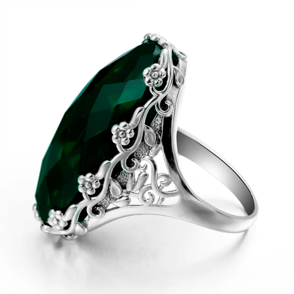 Damen-Ring aus 925er Sterlingsilber mit smaragdgrünem Stein und aufwändigem Blütenmuster