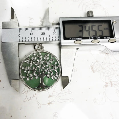 Runder Anhänger aus Sterlingsilber 925 mit grünem Lebensbaum und glänzendem Rahmen