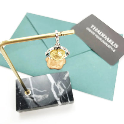 Damen-Charm-Anhänger Globus drehbar World of Rebels aus Sterlingsilber