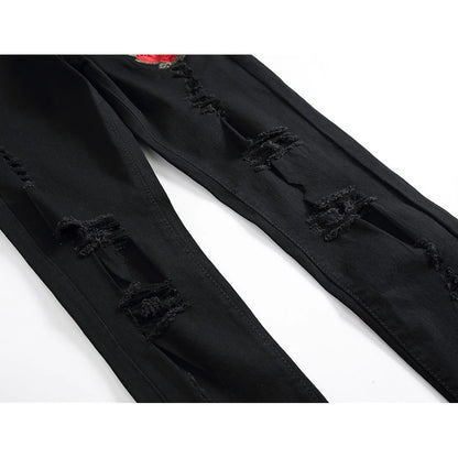 Herren Jeans mit zerrissenen Details und bestickten Rosen im Skinny-Stil