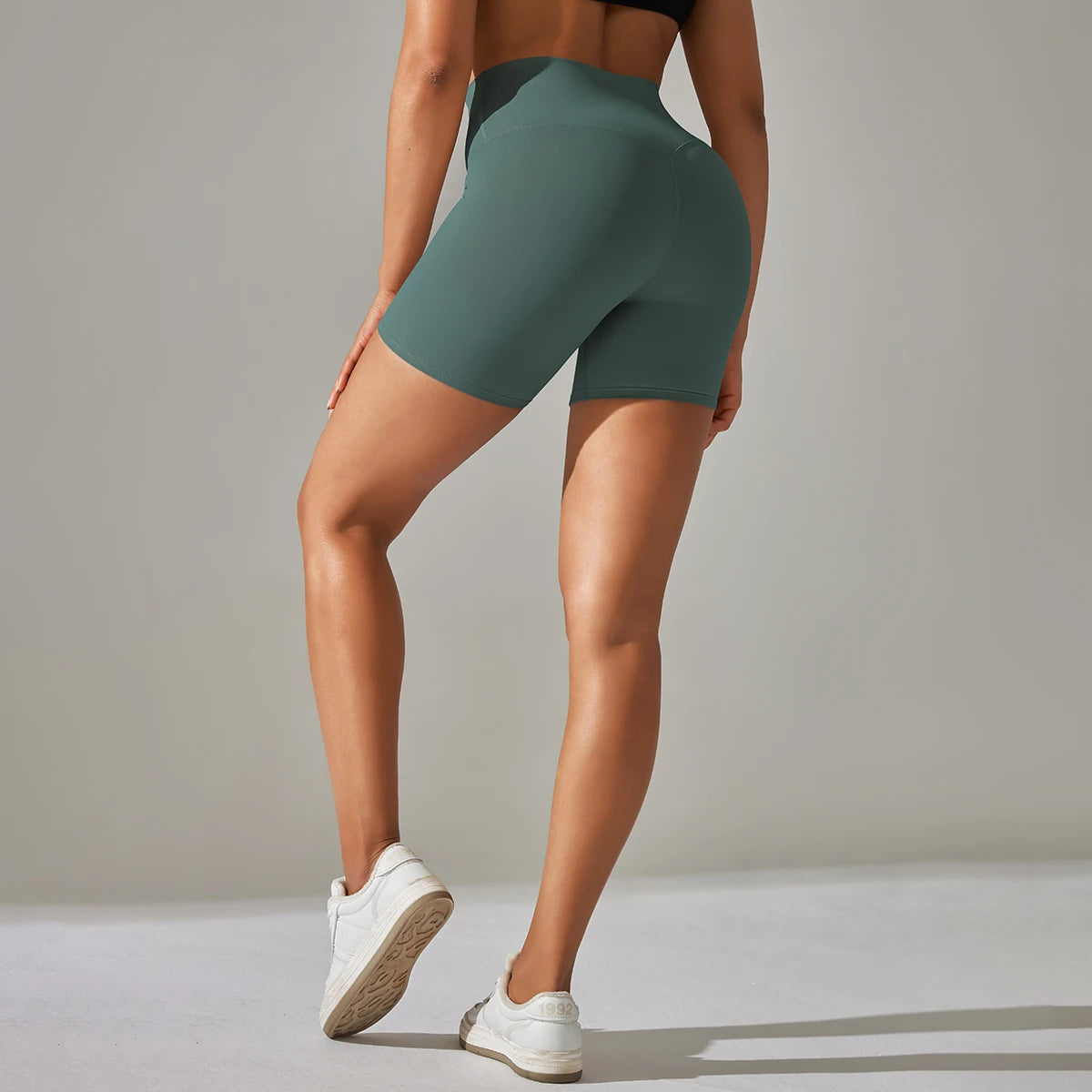 Nahtlose Sportshorts für Frauen mit hohem Bund, petrolgrün, Seitenansicht