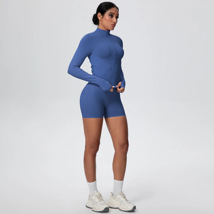 Damen Yoga-Set in Blau, Seitenansicht: Langarm-Top mit Reißverschluss und kurze Shorts