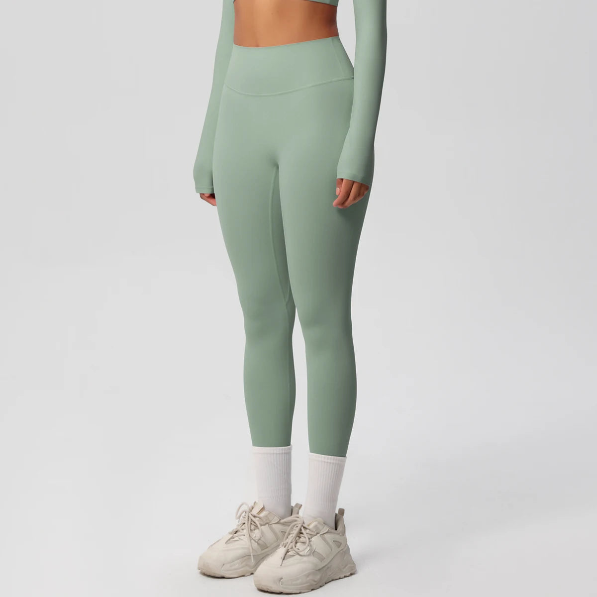 Damen-Yoga-Leggings in Salbeigrün, 3/4-Ansicht, hoch geschnittener Bund