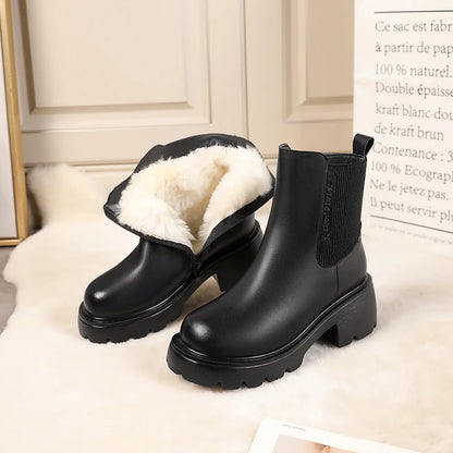 Schwarze Chelsea-Boots aus Leder mit elastischem Einsatz und warmem Wollfutter