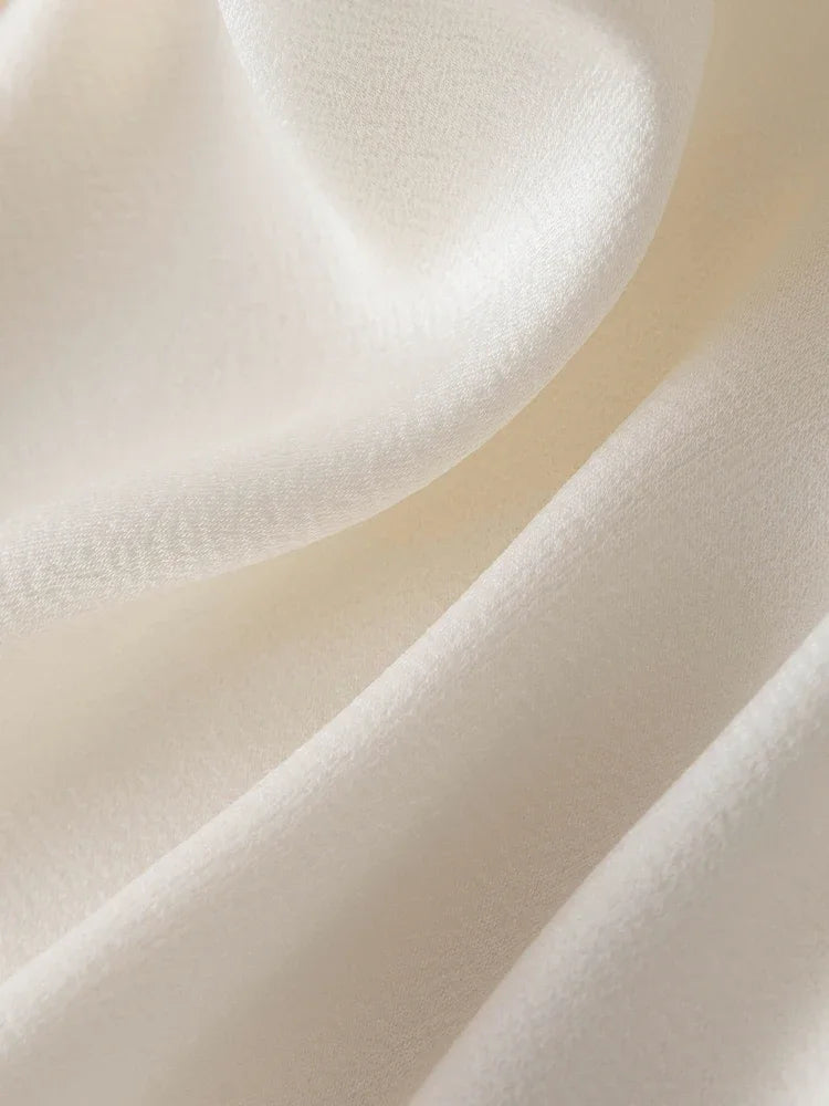 Langarm-Bluse aus 100% Baumwolle in Rosa mit Polo-Kragen und Fake-Layer-Design – Perfekt für den Frühling