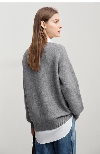 Grau melierter Pullover mit Schleifenmuster auf dem Rücken, Rundhalsausschnitt, lange Ärmel