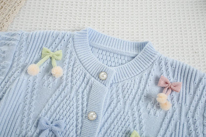 Mädchen Strickjacke in Candy-Farbe mit Bogen für den Herbst