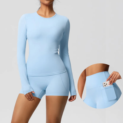 Damen-Yoga-Set Himmelblau mit langarmigem Shirt und Shorts, Taschenöffnung