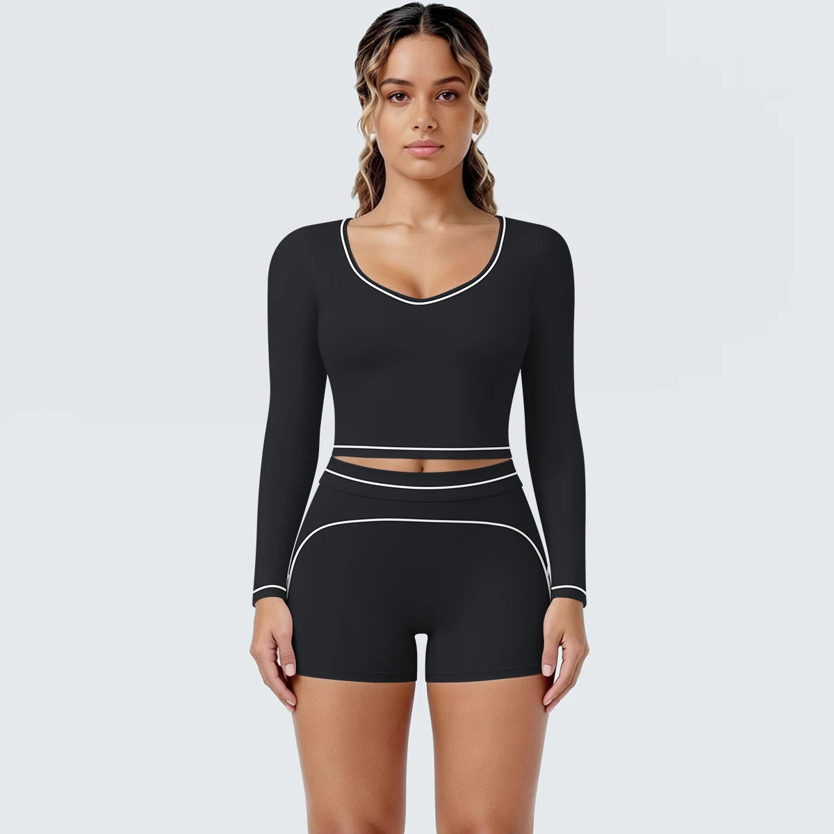 Yoga-Set Schwarz mit langarmigem Crop-Top und Shorts, Kontrastpaspeln an Ausschnitt