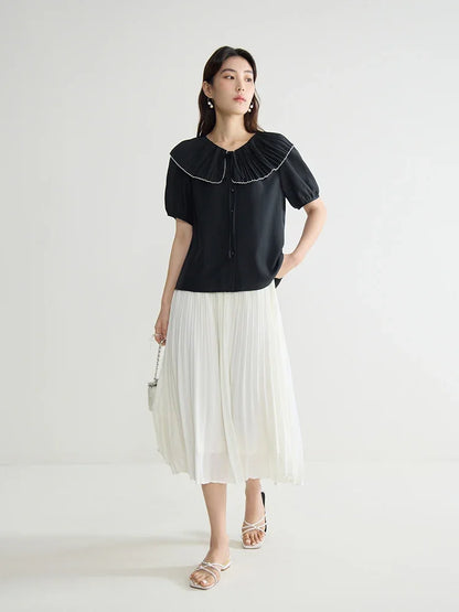 Elegante schwarze Bluse mit französischem Flair und figurformender Silhouette – Sommer-Textur für große Größen