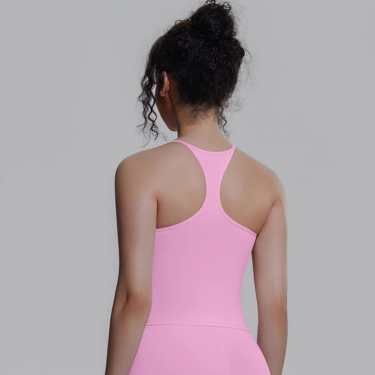 Sportweste für Fitness in Pink mit Trägern und Brustpolster, Rückansicht