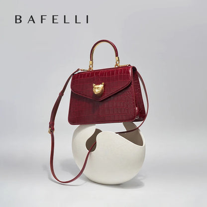 Business-Ledertasche mit Kroko-Optik, rot, mit Schulterriemen und goldener Verschlussplatte