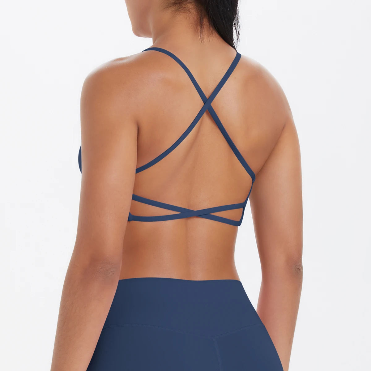 Damen-Yoga-BH Rückansicht mit gekreuzten Trägern und Riemen, blau