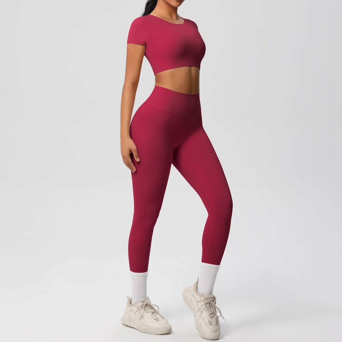 Yoga-Set für Damen: Crop-Top und High-Waist-Leggings, bordeauxrot, seitliche Ansicht.