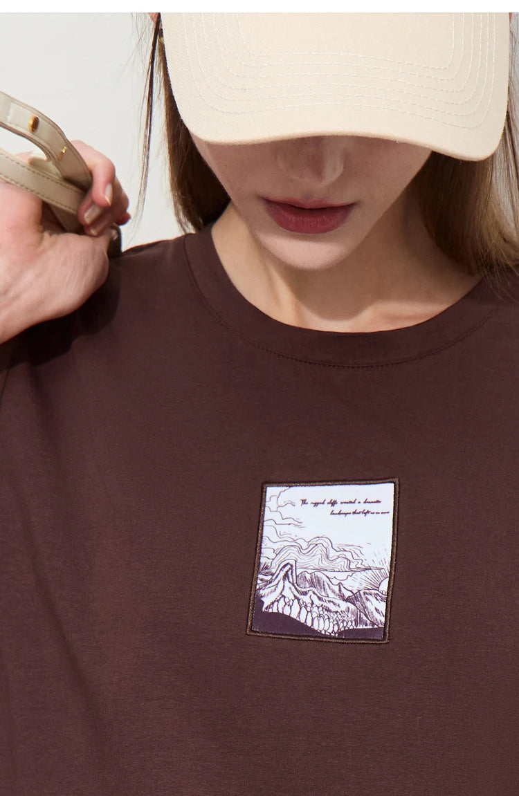 Damen T-Shirt aus Baumwolle mit lässigem O-Ausschnitt und modischer Stickerei
