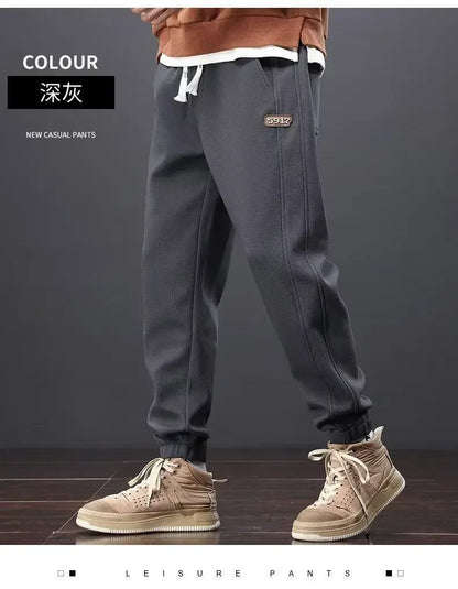 Herrenhosen Herbst und Winter Japanische Krawatten Lose Sport Kordelzug Warme Freizeithosen