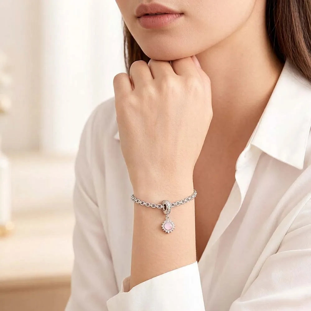 Sterlingsilber-Armband mit schimmerndem rosa Anhänger an ovalem Schließe