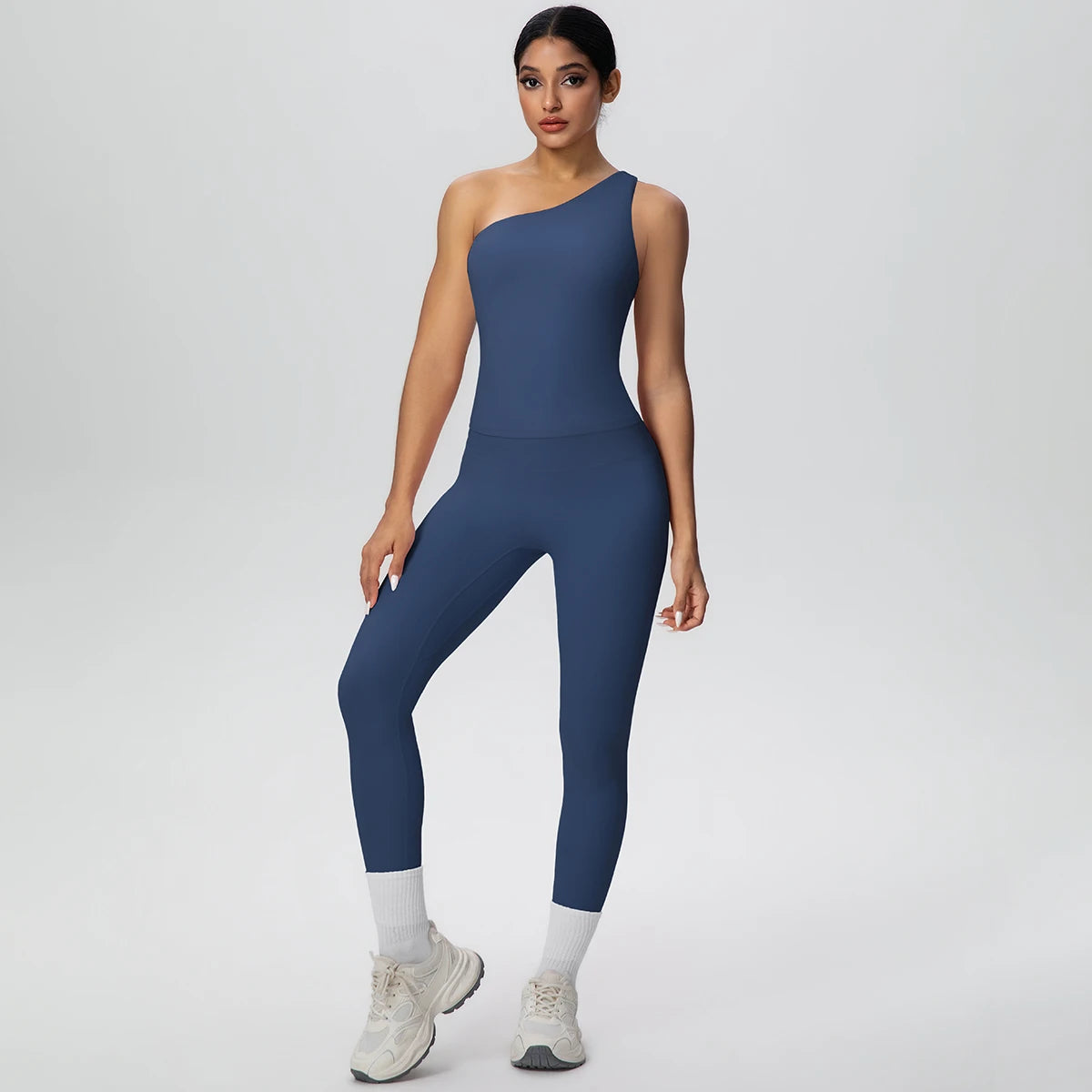Dunkelblaues Yoga-Sportset mit ärmellosem Crop-Top und Leggings, hoher Bund und Beinabschlüsse