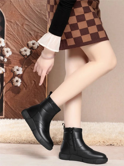 Damen-Winterstiefelette mit Kunstfellfutter, Profilsohle und Blockabsatz, schwarz